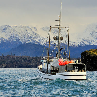 A fishing boat out on the water.